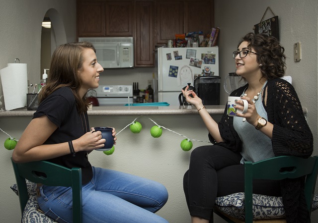 Woman chatting in apartment